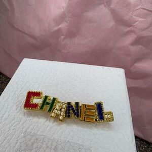 Chanel Vibrant Logo Brooch with pearls